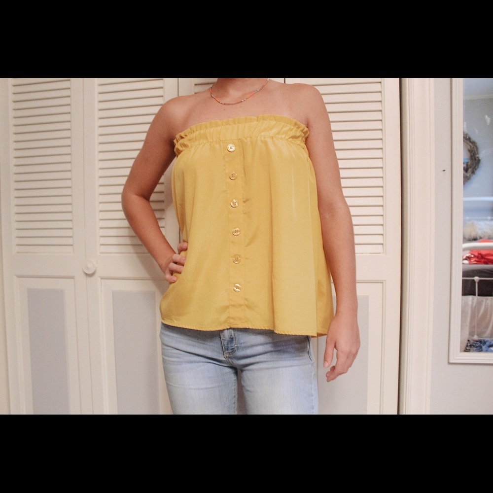 Yellow top with buttons